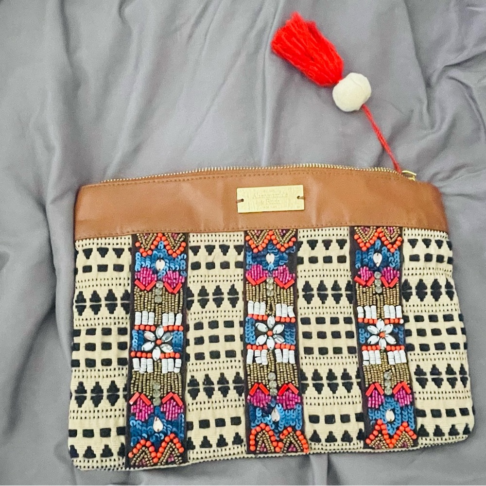 Hobo Women Clutch. Small pocket inside.